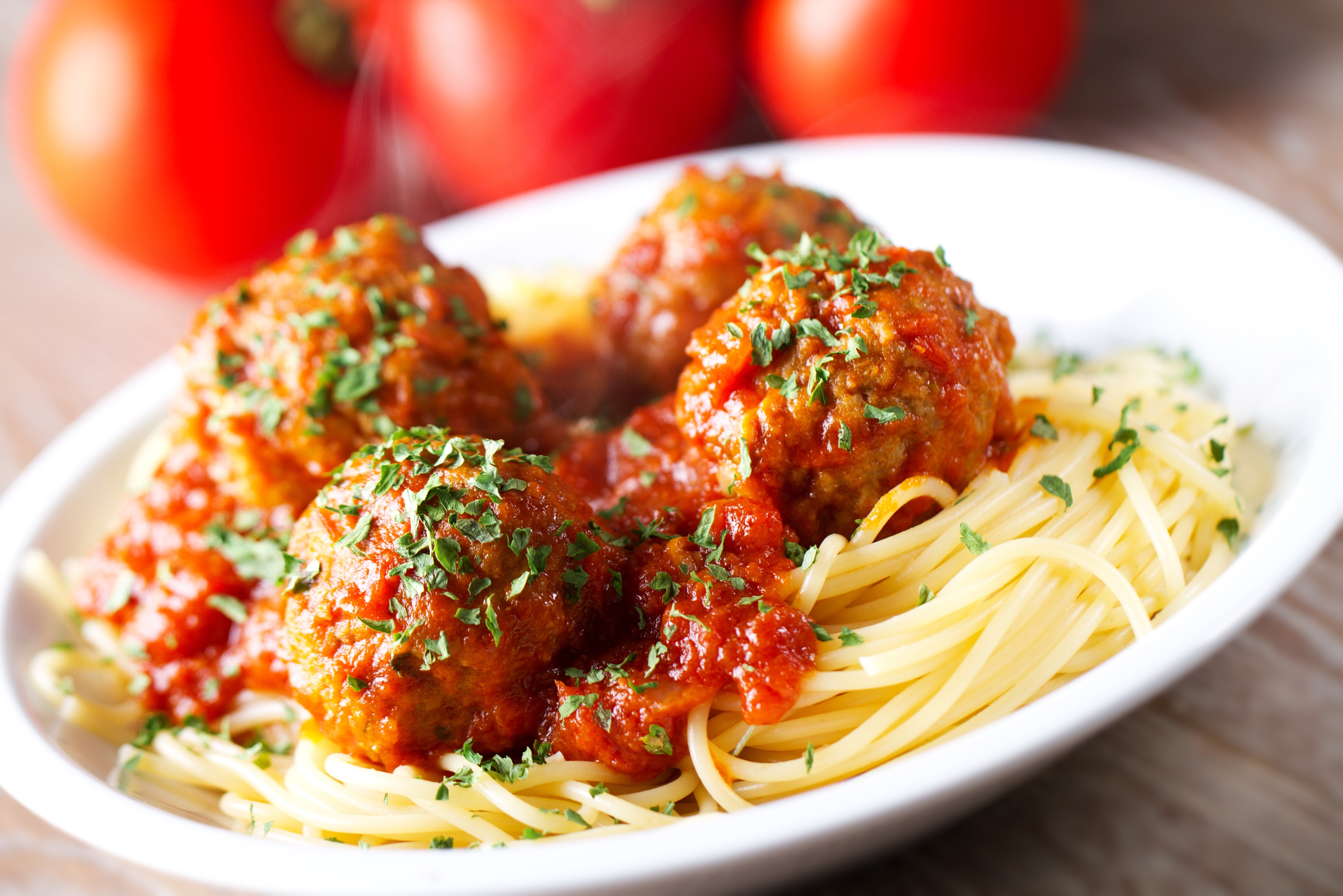 Senior-Approved Swedish Meatballs – Classic Swedish-style meatballs over soft fettuccini pasta, garnished with parsley, offering protein in a gentle, easy-to-eat form.